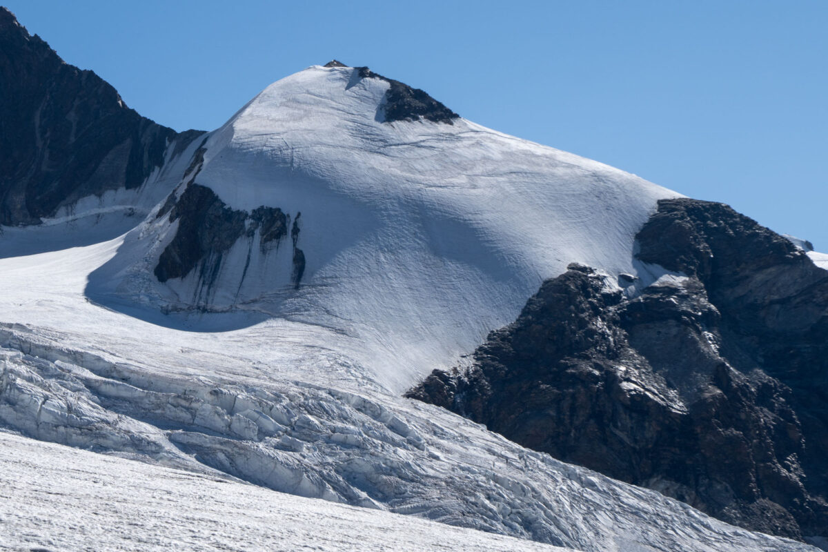 Naso del Liskamm. If you zoom in you can see two climbers on the ice ridge just above the rock.